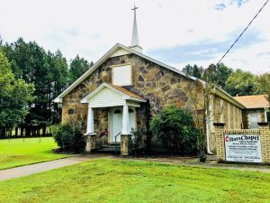 A photo of Hays Chapel, showcasing the colorful stones of the building