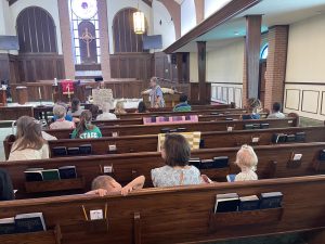 Congregation members in the sanctuary of Nashville FUMC