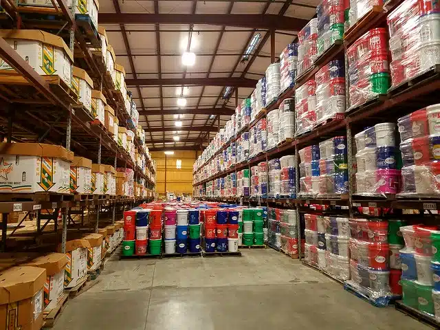 Photo of supplies stacked in a warehouse.
