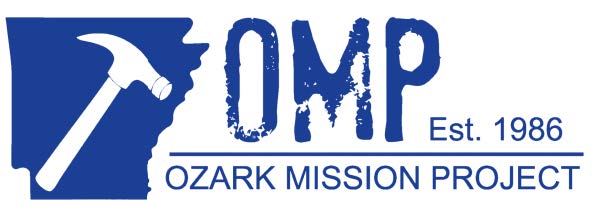 Ozark Mission Project logo showing a white silhouette of a hammer in a blue shape of the state of Arkansas