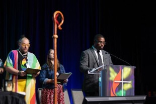 Clergy standing on a stage